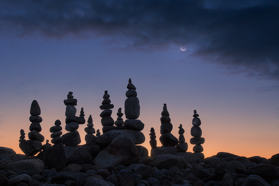 While stacking stones before dawn I was greeted by the crescent moon.