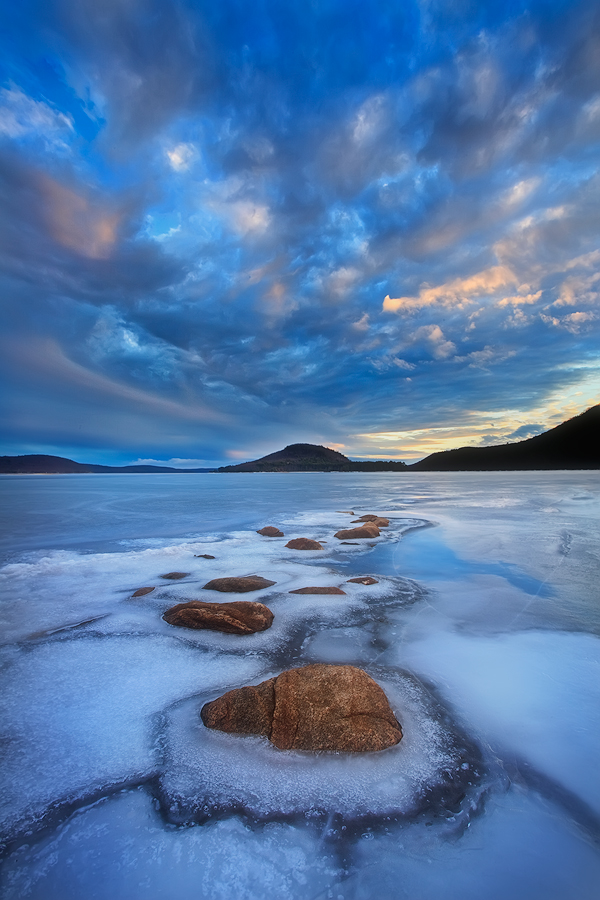 Quabbin reservoir, Massachusetts, winter, ice, sunset, rocks