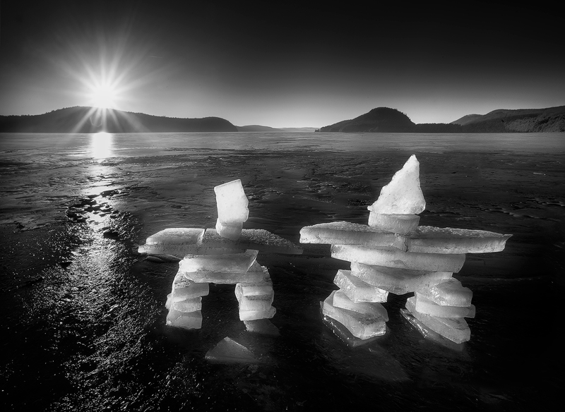 An early morning collecting ice chunks from the river and creating these inukshuks before sunrise. I had frozen hands for the...