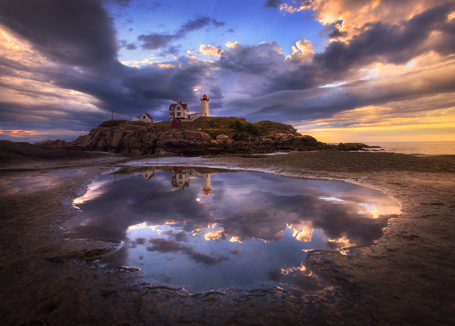 This was my first sunrise at Nubble Lighthouse a few years ago and it was a special lightshow! After a little searching I found...