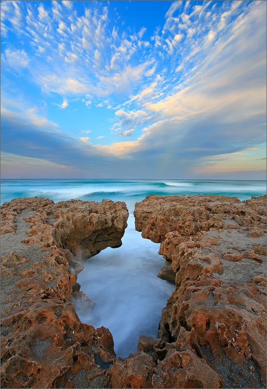 Sunset at Blowing Rocks. This interesting hole in the limestone cliffs was destroyed by hurricane Sandy in 2013.