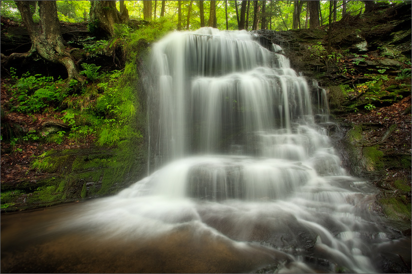 A waterfall I have been to many times. I'm always amazed at how water level, environmental conditions and light can present completely...